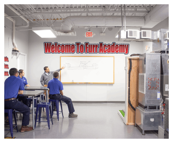 FH Furr employees in learning in Furr Academy