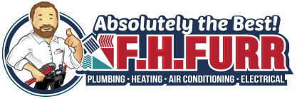 F.H Furr technician performing air conditioning repair