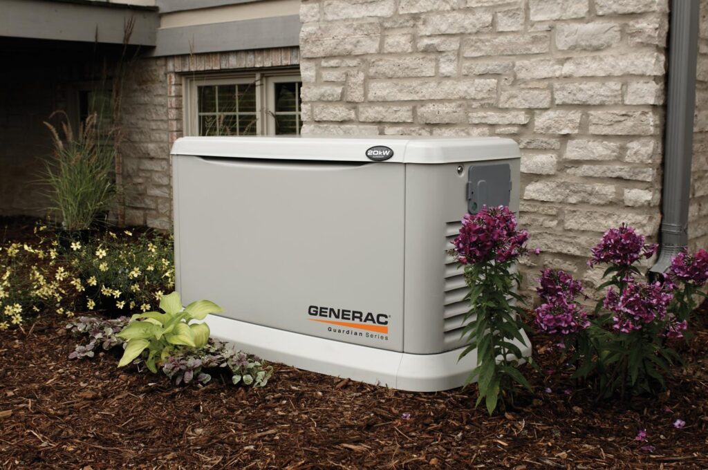 New Generac generator installed next to a white brick home in Northern Virginia.
