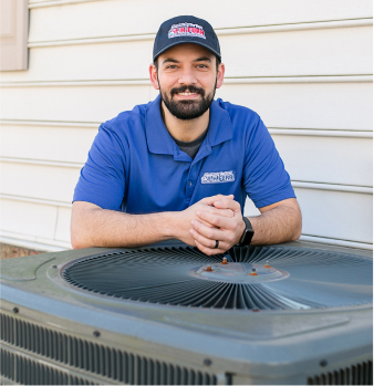 F.H Furr technician performing air conditioning repair