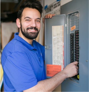 F.H Furr technician performing air conditioning repair