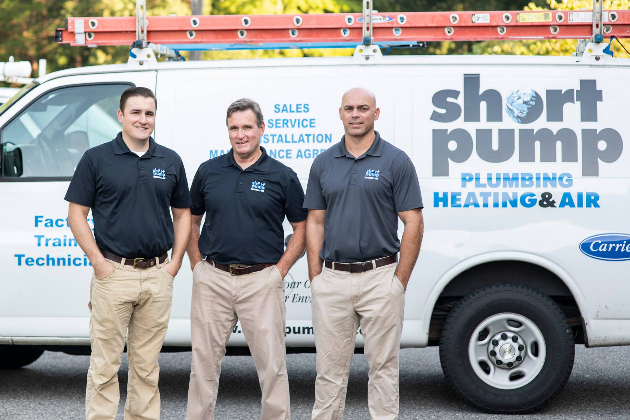 F.H. Furr employees standing in front of truck