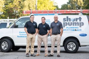 short pump heating and air employees standing in front of short pump truck