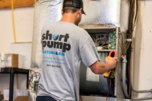 Furnace installation by Short Pump Heating & Air technician.