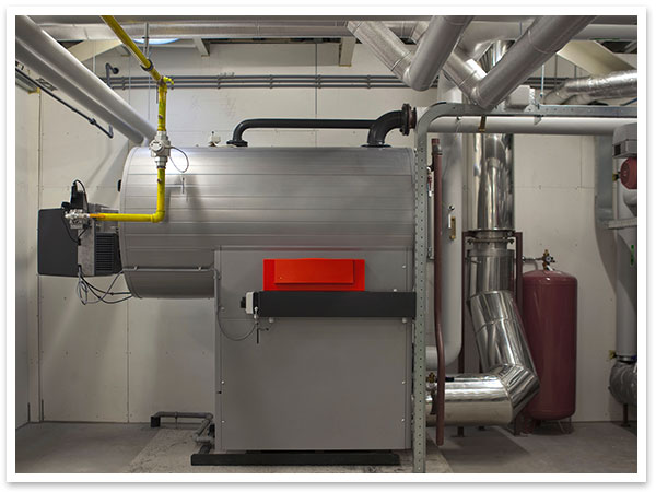 Image of a boiler in a basement.